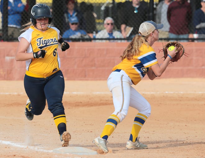 Andrew College's Taylor Sheffield is out as Gulf Coast's Haley Wood catches the ball. Gulf Coast faced off with Andrew College for a softball game on Friday. PATTI BLAKE/THE NEWS HERALD