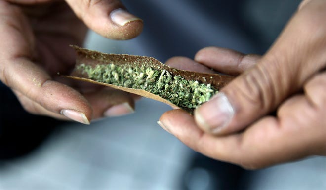 Oklahoma Gov. Kevin Stitt has signed a so-called Unity Bill to regulate the state's booming marijuana industry. [AP PHOTO]