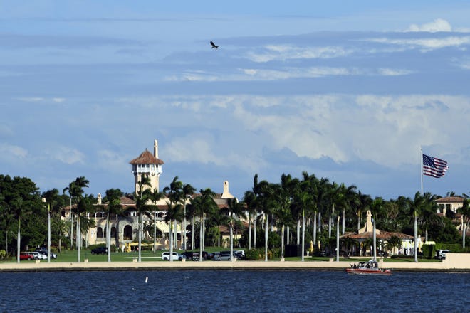 FILE - This Nov. 21, 2018, file photo shows President Donald Trump's Mar-a-Lago estate in Palm Beach, Fla. A company run by a donor to Trump claimed it could provide Chinese clients with a chance to mingle and take photos with the president, along with access to his private club at Mar-a-Lago. (AP Photo/Susan Walsh, File)