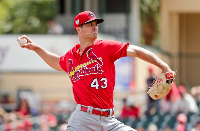 St. Louis Cardinals starter Dakota Hudson (43) delivers a pitch in the first inning during an exhibition spring training baseball game against the Miami Marlins on Wednesday. [BRYNN ANDERSON]