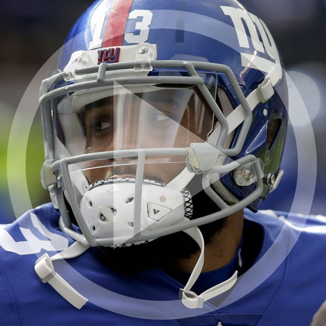New York Giants wide receiver Odell Beckham (13) warms up before playing against the Washington Redskins in an NFL football game, Sunday, Oct. 28, 2018, in East Rutherford, N.J. (AP Photo/Seth Wenig)