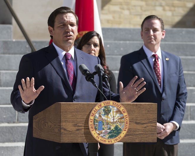 Gov. Ron DeSantis announces he is suspending Palm Beach County Supervisor of Elections, Susan Bucher at a press conference in front of the old County Courthouse Friday in West Palm Beach on Jan. 18. [ALLEN EYESTONE/Gatehouse File]