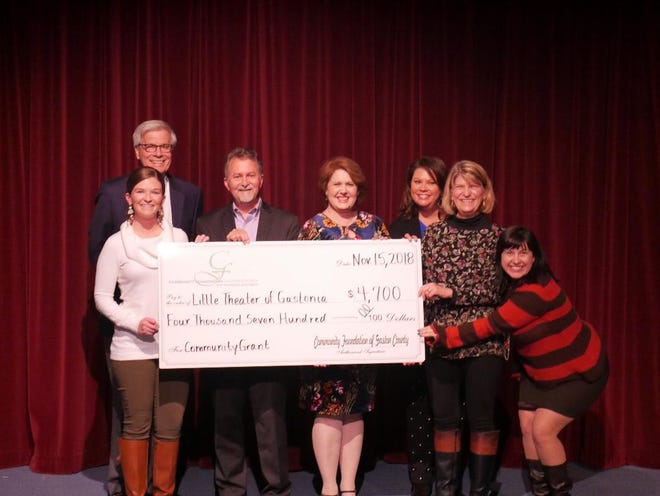Pictured are supporters of Little Theater of Gastonia with Ernest Sumner, left, president of the Community Foundation of Gaston County. [PROVIDED PHOTO]