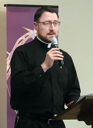 The Rev. Lucas Rossi of St. Michael's Catholic Church spoke Wednesday to more than 200 people who gathered at Gastonia First Presbyterian Church for the first of six weekly Lenten lunch gatherings. [KEVIN ELLIS/THE GAZETTE]