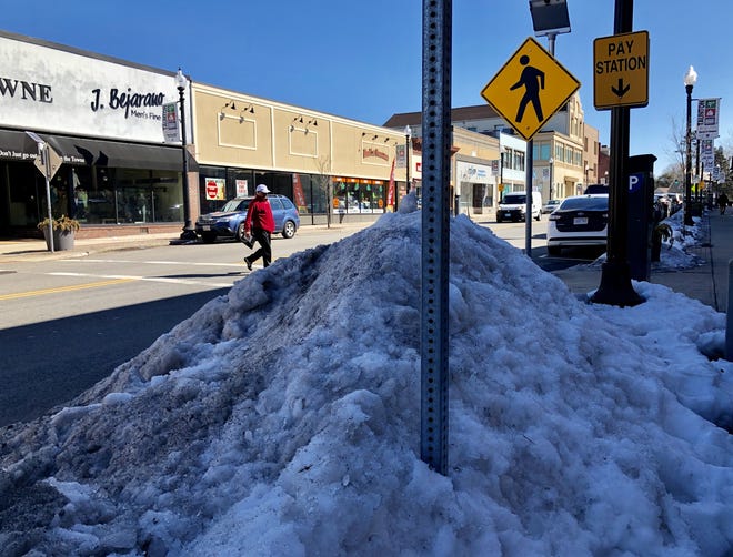 More than a week after a snowstorm a small snow bank remains near a crosswalk on Main Street.

Taunton Gazette photo by Charles Winokoor