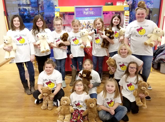 Troop members of Girl Scout Troop 1996 each made build-a-bear with a special wish for area children who are at local Children's Hospitals. The girls used their proceeds from recent cookie sales to give back to kids in hopes to make them smile. Front, l to r, Paisley Linton and Sophia Ross; middle group, Miah Gray, Hailey Workman, Brenley Boylen, Addison Johnson; back, Raelynn Miller, Mikaela Linton, Ashlyn Franklin, Kynsleigh Bivens, Sadie Lilly, Stella Plaster, Makenna Boylen. The Troop meets at Buckeye Trail Elementary.