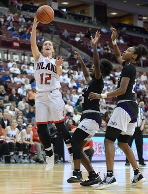 Hiland's Morgan Yoder (left) puts up a shot over Columbus Africentric defenders during their Division III state semifinal Thursday at the Schottenstein Center in Columbus. Yoder finished with a game-high 21 points in the Hawks' 61-48 Final Four loss to the Nubians.