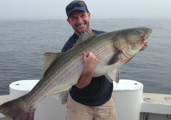 Kevin Ward, of Bristol, Conn., caught a 52-pound striped bass on the south side of Block Island in 2017.