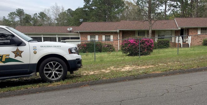The Panhandle Animal Weldare Society and the Okaloosa County Sheriff's Office are investigating the death of more than 20 pets at a home on Woodcliff Drive just north of Crestview. [ASHLEIGH WILDE/DAILY NEWS]