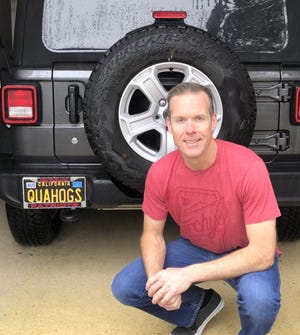 Matt MacDougall, of Orange County, California, shows off his license plate. [Courtesy of Matt MacDougall]