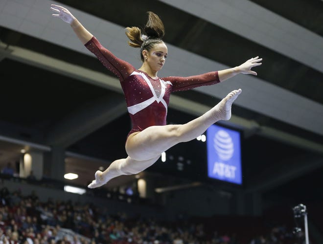 Wynter Childers competes on the balance beam during the senior night performance against Auburn in Coleman Coliseum Friday, March 1, 2019. The Crimson Tide travels to face the No. 1 Oklahoma Sooners tonight. [Staff Photo/Gary Cosby Jr.]