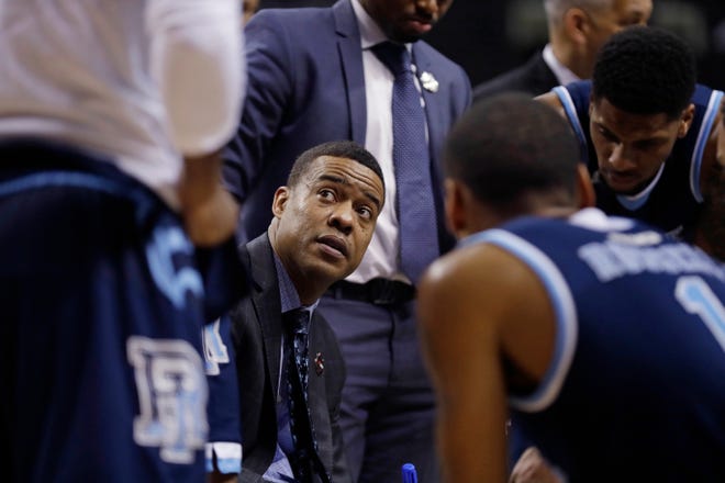 URI head coach David Cox, talking to his team during a timeout in the first half of Saturday’s game against St. Bonaventure in Brooklyn, N.Y., is one of 12 finalists for the Joe B. Hall Award, which is presented to the top first-year head coach in Division I. [AP / Frank Franklin II]