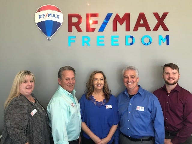 The RE/MAX Freedom team, from left, Stephanie Ray, Clay Bass, April Couturier, Edward Couturier and Jacob Pfaff. [Submitted]