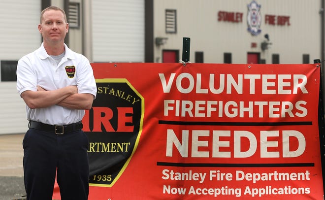 Assistant Chief Michael Hullett stands outside the Stanley Fire Department on Blacksnake Road in Stanley Friday morning, March 15, 2019. [Mike Hensdill/The Gaston Gazette]