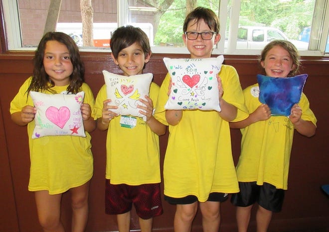 Campers at Camp Angel Wings memorialize loved ones through various crafts and activities. [CONTRIBUTED]