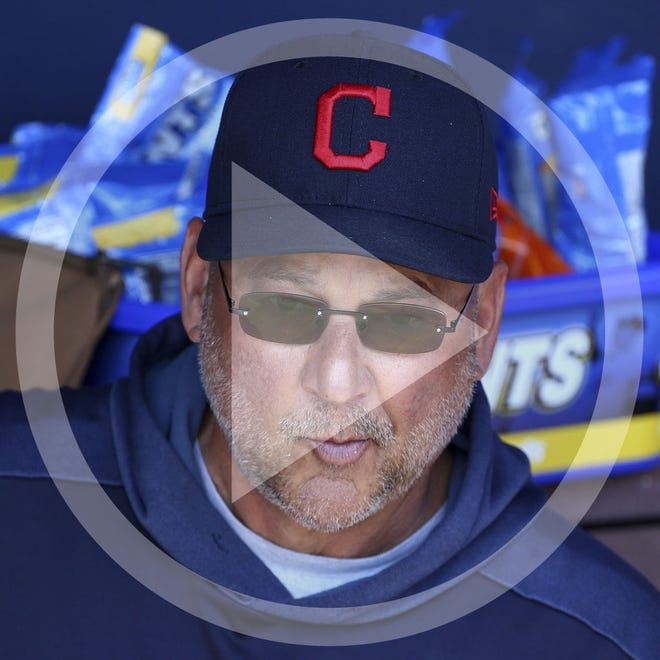 Cleveland Indians manager Terry Francona sits in the dugout prior to a spring training baseball game against the San Diego Padres Monday, March 4, 2019, in Peoria, Ariz. (AP Photo/Ross D. Franklin)