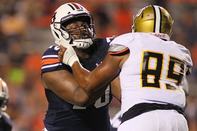 Auburn tackle Calvin Ashley (70) played in five games for the Tigers last season. [GREG MCWILLIAMS/247 Sports]