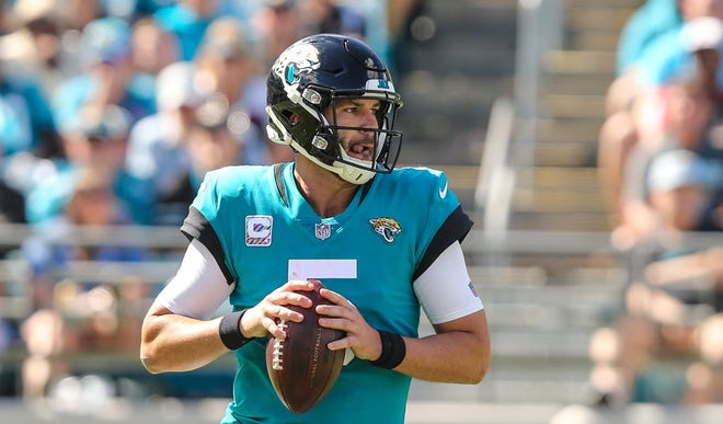 Jacksonville Jaguars quarterback Blake Bortles (5) looks for a receiver during the first half of an NFL football game against the Houston Texans at TIAA Bank Field in Jacksonville, Fla., Sunday, Oct. 21, 2018. [For The Florida Times-Union/Gary Lloyd McCullough]