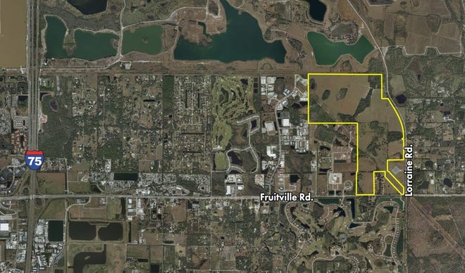 Aerial view of 450-acre tract acquired by Neal Communities for a 900-unit community north of Fruitville Road and west of Lorraine Road.

[Photo provided by LSI Companies Inc.]
