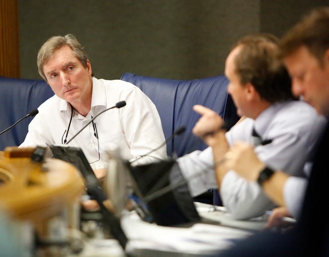 Commissioner Mike Byerly listens to comments during a meeting of the board of Alachua County Commissioners in Gainesville on Jan. 23, 2018. Byerly has been notified of at least 30 times for code violations at rental property he owns. [Brad McClenny/The Gainesville Sun]