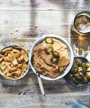 This smoked bean dip from "Thank You for Smoking" by Paula Disbrowe is make with beans that have been smoked in a backyard grill. [Contributed by Johnny Autry]