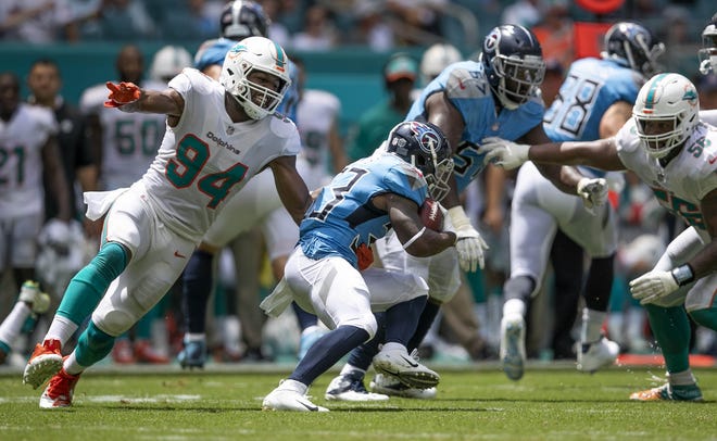 Miami Dolphins defensive end Robert Quinn may be on the move to Dallas. [ALLEN EYESTONE/palmbeachpost.com]