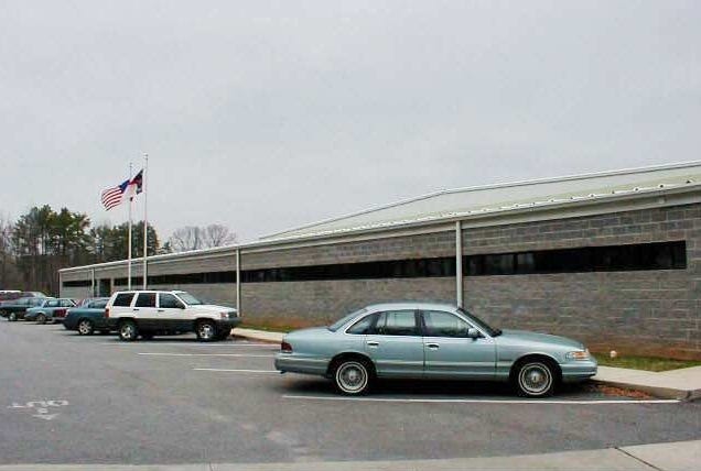 Washington Alloy has acquired this 54,000-square-foot building on Groves Street in Lowell for $2.5 million. [Gaston County Tax Office]