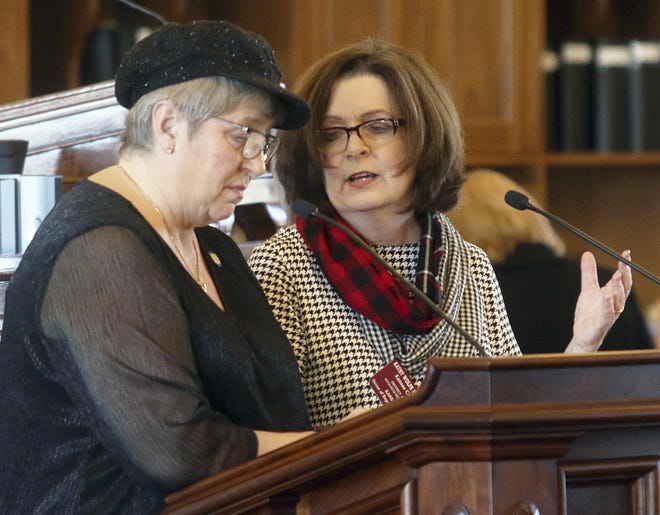 Rep. Kathy Wolfe Moore, D-Kansas City, right, answers questions from Rep. Brenda Landwehr about an amendment Moore introduced that completely wiped out a bill crafted by House Majority Leader Dan Hawkins, a Wichita Republican and outspoken opponent of Medicaid expansion. [Thad Allton/The Capital-Journal]