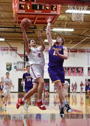 Shawnee Heights senior Tyce Brown, left, has been chosen to the United Kansas Conference all-league first team. [March 2019 file photo/The Capital-Journal]