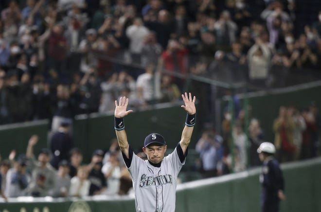 Seattle Mariners right fielder Ichiro Suzuki returns to the field for waiting fans after Game 2 of the Major League Baseball opening series against the Oakland Athletics on Thursday in Tokyo. The 45-year-old Mariners star announced his retirement Thursday night, shortly after waving goodbye at the Dome. [AP Photo/Koji Sasahara]