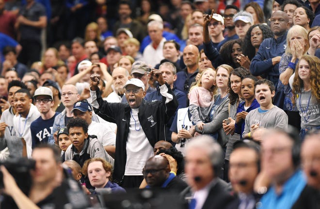 Yale fans had something to cheer about Thursday when their team cut into its second-half deficit against LSU. However, the Tigers held on to win 79-74. [Bob Self/Florida Times-Union]