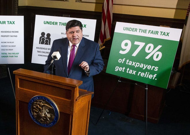 Illinois Gov. J.B. Pritzker unveils his graduated income tax plan during a press conference March 7 in the governor's office at the Illinois State Capitol in Springfield, Illinois. [Justin L. Fowler/The State Journal-Register]