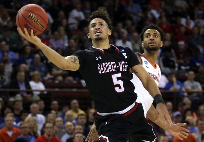 Jose Perez shoots for a basket during the NCAA tournament opener in Columbia, South Carolina on Friday. [Brittany Randolph/The Star]