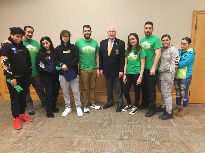 True Course graduates from New Bedford — Devin, Nellyanne, Karina, Franchesca and Luis — are pictured with Bristol County Sheriff Thomas M. Hodgon and Youth Outreach Deputies Mike Valler, Bruno Ventura, Mariah Carvalho and Tyler Oliveira.