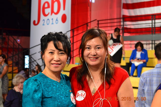 Cindy Yang (right) and Monica Shang both served on the board of the China Association for Science and Technology, a group linked to the Chinese Communist Party. They appeared together at a Jeb Bush rally in June 2015. [AsianAmericanforJeb.com]