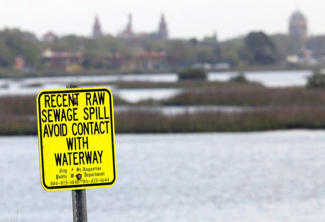 A sign, placed on the west side of the State Road 16 bridge in 2015, warns of a raw sewage spill. Raw sewage spills are not uncommon in the city of St. Augustine. For about the past five years, close to 785,000 gallons of sewage spills have been reported that were the city's responsibility. Of that, the city estimates more than 695,000 gallons of sewage reached water bodies. [FILE/THE RECORD]