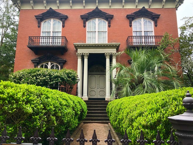 First stop on a "Midnight in the Garden of Good and Evil" tour is the Mercer Williams House Museum, setting for the book, which revolves around the owner and the death of his young lover. [Photo by Cheryl Blackerby]