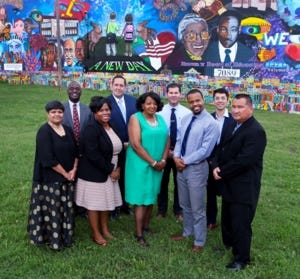 Members of last year's first class of the Strategic Leadership Academy and others involved with that program stand in front of a mural near the Brown v. Board of Education Historic Site. Those pictured are in the front row, from left to right, Sheni Meghani, LeTiffany Obozele, Joyce Revely, Michael Williams and Ron Ekis Jr.; and in the back row, from left to right, Cain Davis, Richard Ramos, Rico Aguayo and Leobardo Espinoza Jr. [Thad Allton/The Capital-Journal]
