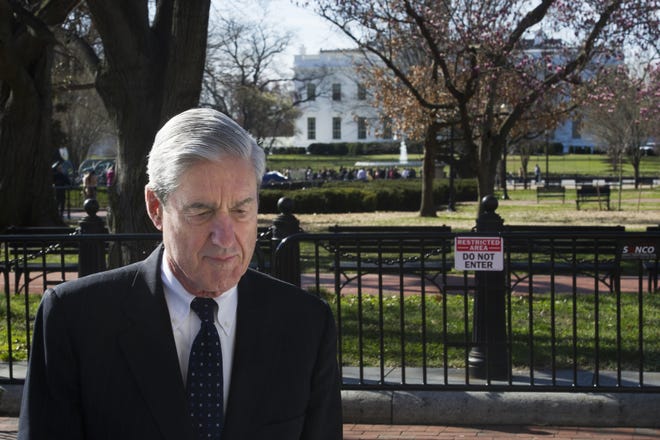 Special Counsel Robert Mueller walks past the White House after attending services at St. John's Episcopal Church, in Washington on Sunday. Mueller closed his long and contentious Russia investigation with no new charges, ending the probe that has cast a dark shadow over Donald Trump's presidency. [Cliff Owen/The Associated Press]