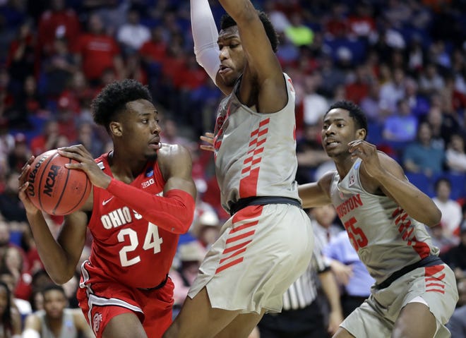 Coach Chris Holtmann praised Andre Wesson (24) for his dedication in the offseason to get better, which showed on the court this season. [Jeff Roberson/The Associated Press]