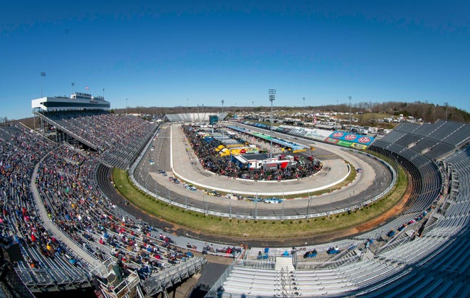Fans enjoy the NASCAR Truck Series race at Martinsville Speedway in Martinsville, Va. Saturday, March 23. (AP Photo/Matt Bell)