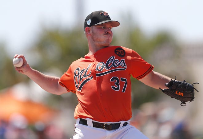 Baltimore Orioles starting pitcher Dylan Bundy (37) delivers in the second inning of a spring training game against the New York Mets on Monday in Sarasota. The Orioles lost 9-7. [The Associated Press / John Bazemore]