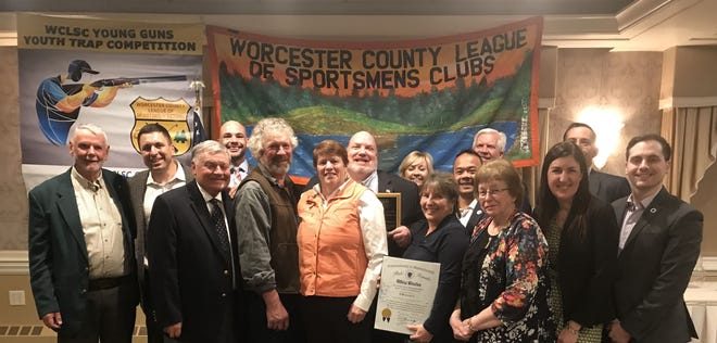 The Worcester County League of Sportsmen's Clubs recently held its annual awards banquet at Wachusett Country Club. Among the honored attendees were Gene Chague, left, state Sec. of Energy and Environmental Affairs Matthew Beaton, Wayne MacCallum, State Rep. Joseph McKenna, Warren dairy farmer Will Rogers, Dianne Benson Davis, State Sen. Donald Humason Jr., State Rep. Kim Ferguson, State Sen. Anne Gobi, State Sen. Dean Tran, State Rep. Jay Barrows, Rosemary Charon, State Rep. Hannah Kane, State Rep. Don Berthiaume and State Rep. David LeBoeuf. [Photo/Mark Blazis]
