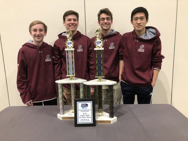 Abington High School chess players, from left, Albert Hatton, Ethan Weilheimer, Yonatan Wiese-Namir and Nathaniel O won matches and scored points at a recent competition that led to the team's national championship. [COURTESY OF ABINGTON SCHOOL DISTRICT]