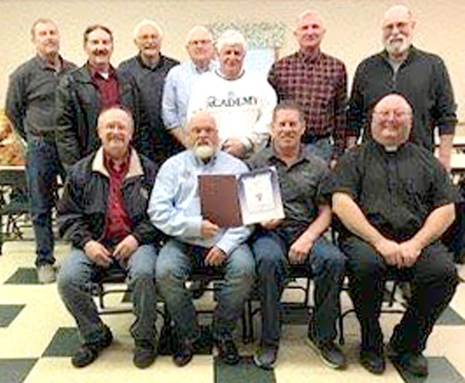 The Knights of Columbus Fourth Degree Father Francis Tretiel Assembly 1736 of Barnesville was recently recognized for a Civic Award by Supreme Knight Carl Anderson. The award was presented for outstanding implementation of patriotic programming faithful to the principles of the Fourth Degree of the Knights of Columbus. Pictured with the award at a recent meeting are, l to r, front row, Marty Schumacher, Tony Sholtis, Jim Schoeppner, Father Wayne Morris; back row, Anthony Schumacher, Steven Burkhart, Herman Gray Jr., John Nau, James Amendolar, Mike Nau and Michael Abbott. Photo was taken by member Michael Feldner.