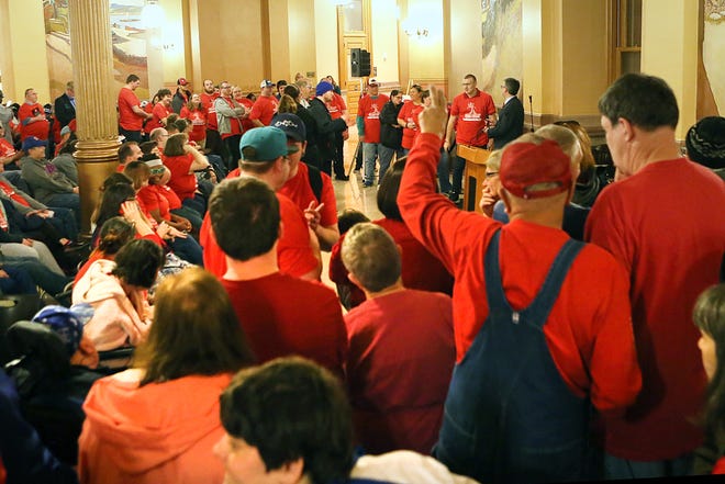 The bulging Capitol rotunda crowd of intellectually and developmentally disabled Kansans on Tuesday chanted in unison to support a proposed 2 percent increase in funding for organizations providing community services. [Thad Allton/The Capital-Journal]