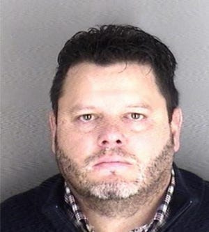 Shawn Parcells, 37, of Leawood, was booked into the Shawnee County Jail on Friday, March 22, in connection with charges of theft and criminal desecration filed in Wabaunsee County. He later bonded out. [Shawnee County Jail]