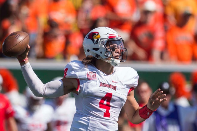 In this file photo, Illinois State quarterback Brady Davis (4) looks to pass during the first half of an NCAA college football game against Colorado State, Saturday, Sept. 22, 2018, at Canvas Stadium in Fort Collins, Colo. (Timothy Hurst/The Coloradoan via AP)