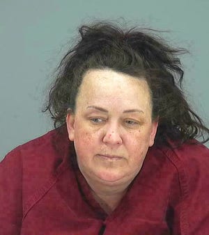 FILE - This file booking photo provided by Pinal County Sheriff's Office shows Machelle Hobson. Hobson, who used to operate a popular YouTube channel featuring children, was indicted Monday, March 25, 2019, on charges that she abused and kidnapped five of her seven adopted children. (Pinal County Sheriff's Office via AP, File)