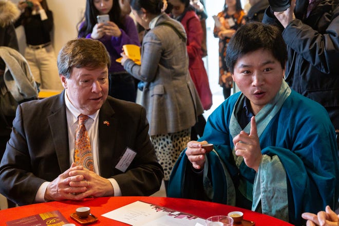Quincy Mayor Thomas Koch participates in a traditional tea ceremony at the Pao Arts Center in Boston to celebrate Boston Chinatown Neighborhood Center's 50th anniversary.

(L.B. Read Photography)